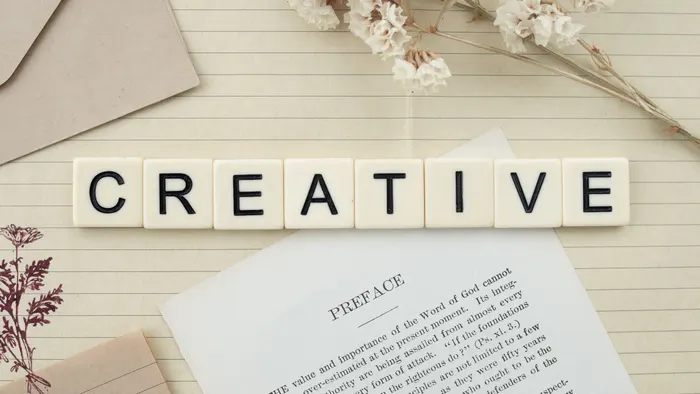 Letter tiles spelling the word CREATIVE