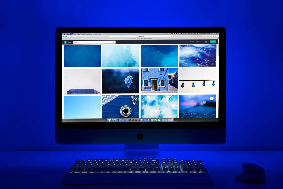 A computer screen with a grid of gallery images on a website